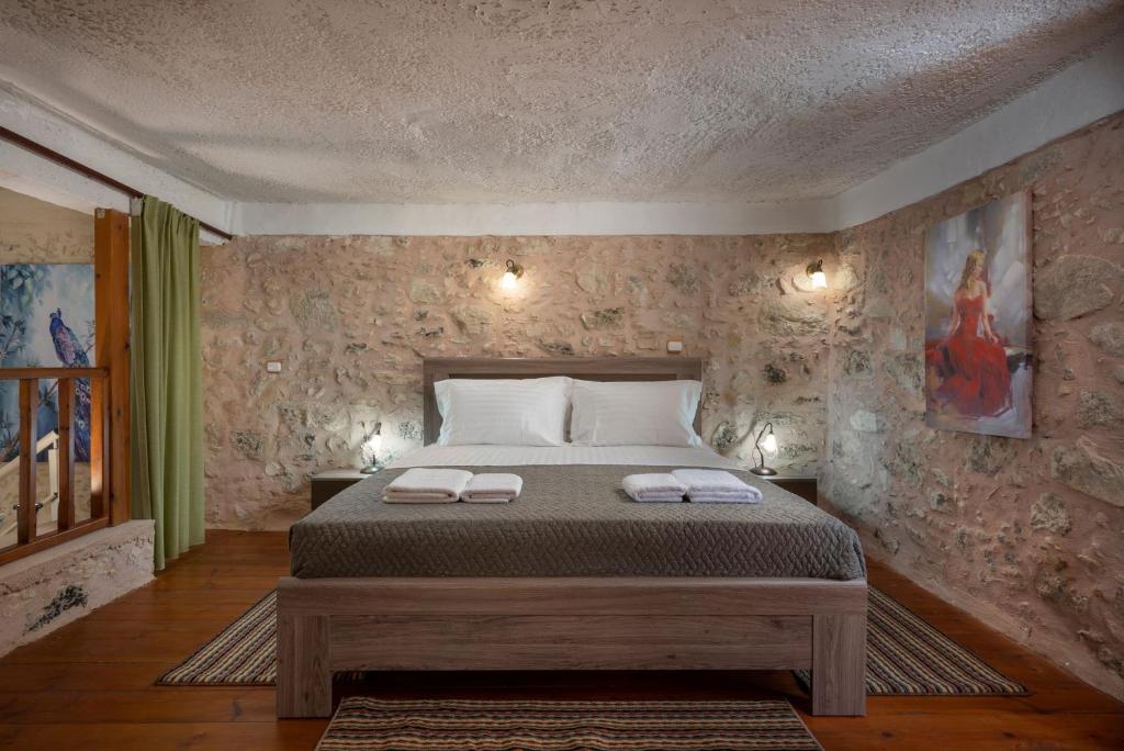 double bed in stone made bedroom